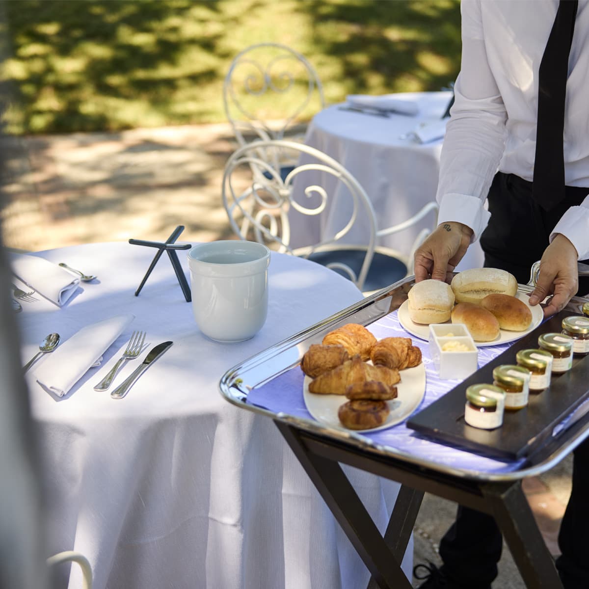 In the garden, accompanied by a beautiful view.
